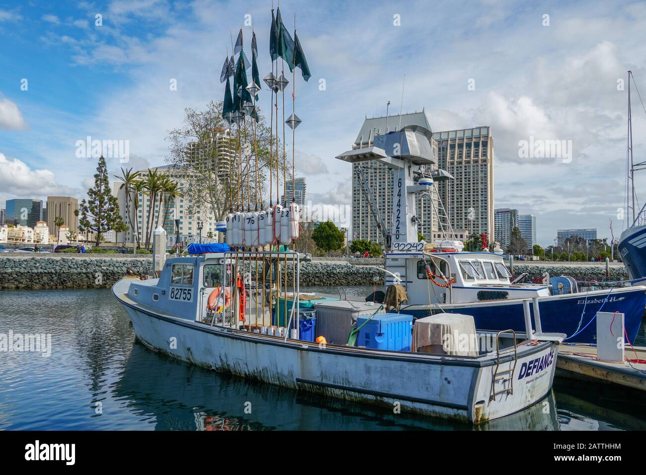 Commercial fishing boats docked in San Diego Harbor. Fish Harbor Pier Located in the downtown area of San Diego adjacent to seaport village. California, USA. January 19, 2020 Stock Photo