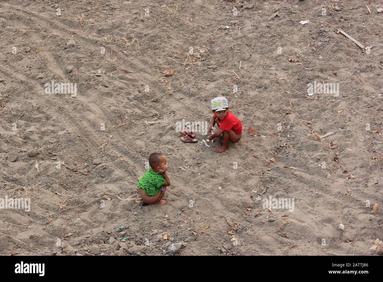 Two Little Burmese Girls Pee On The Sand Stock Photo Alamy