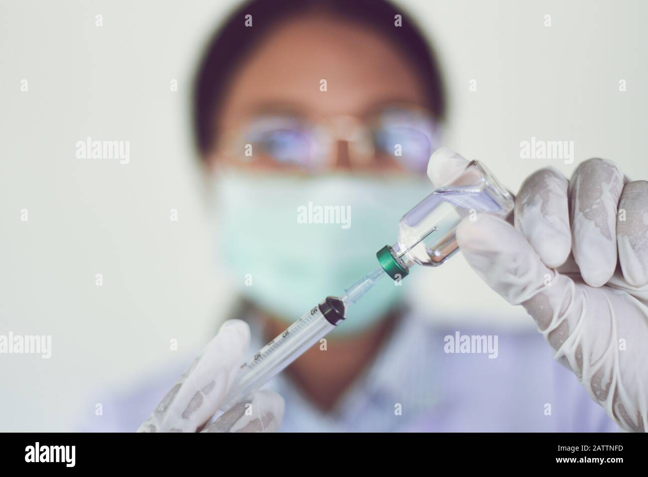 Syringe medication injection and needle in hand nurse for giving