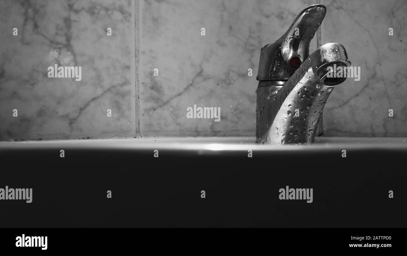 Sink and a tap, let's not waste water. Thirst concept. Stock Photo