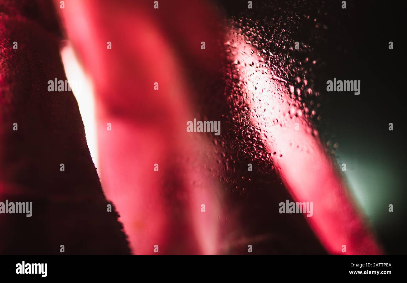 Mirror on a pink background water droplets. Abstract background concept. Stock Photo