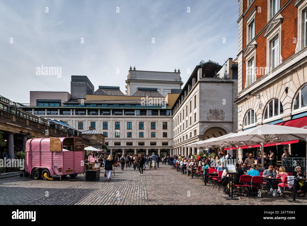 London, UK - May 15, 2019: View of the Covent Garden Market with the restaurant terraces and people sitting. Stock Photo