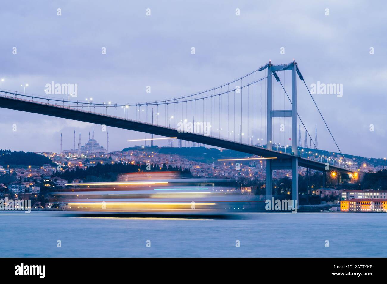 Istanbul, Turkey - Jan 13, 2020: Sunset or Dusk over the First Bosporus Bridge Crossing the Bosphorus or Bosporus Straits Istanbul Turkey. Büyük Çamlı Stock Photo
