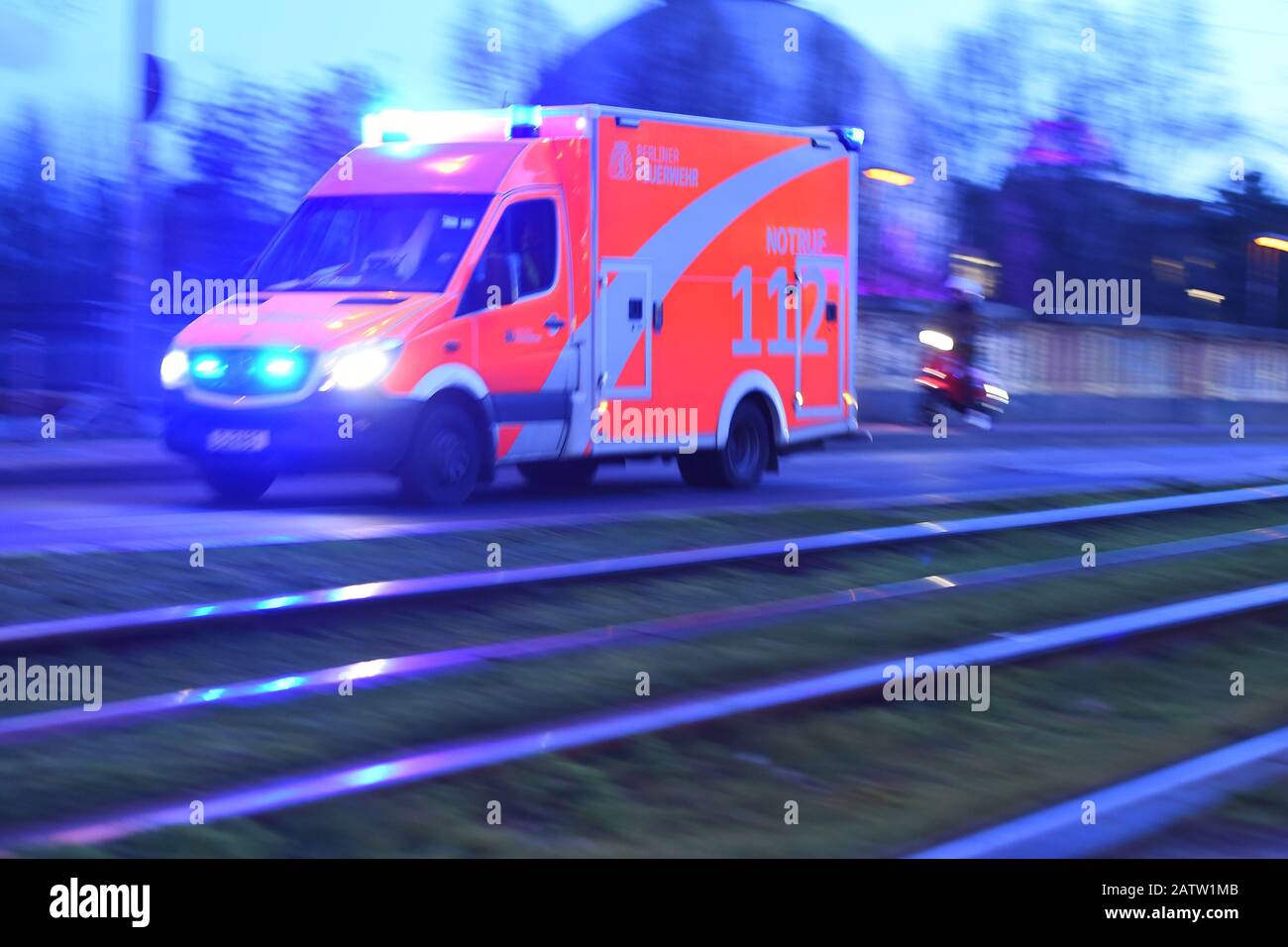 Berlin, Germany. 04th Feb, 2020. An ambulance of the fire brigade drives with blue light on the Prenzlauer Allee, the rails of the tram run parallel. Credit: Sonja Wurtscheid/dpa/ZB/dpa/Alamy Live News Stock Photo
