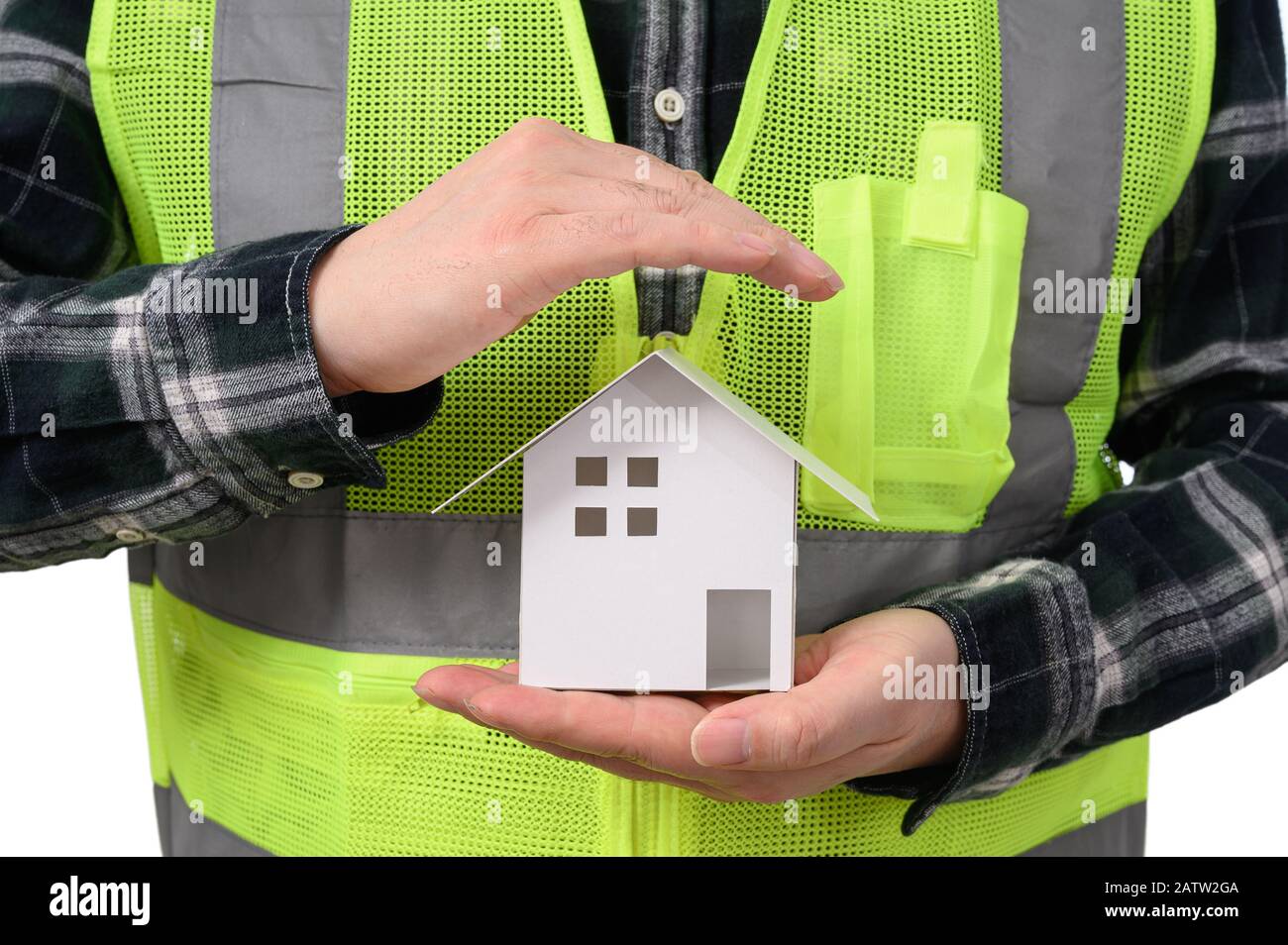 Engineer with house model on hand. Real estate concept Stock Photo
