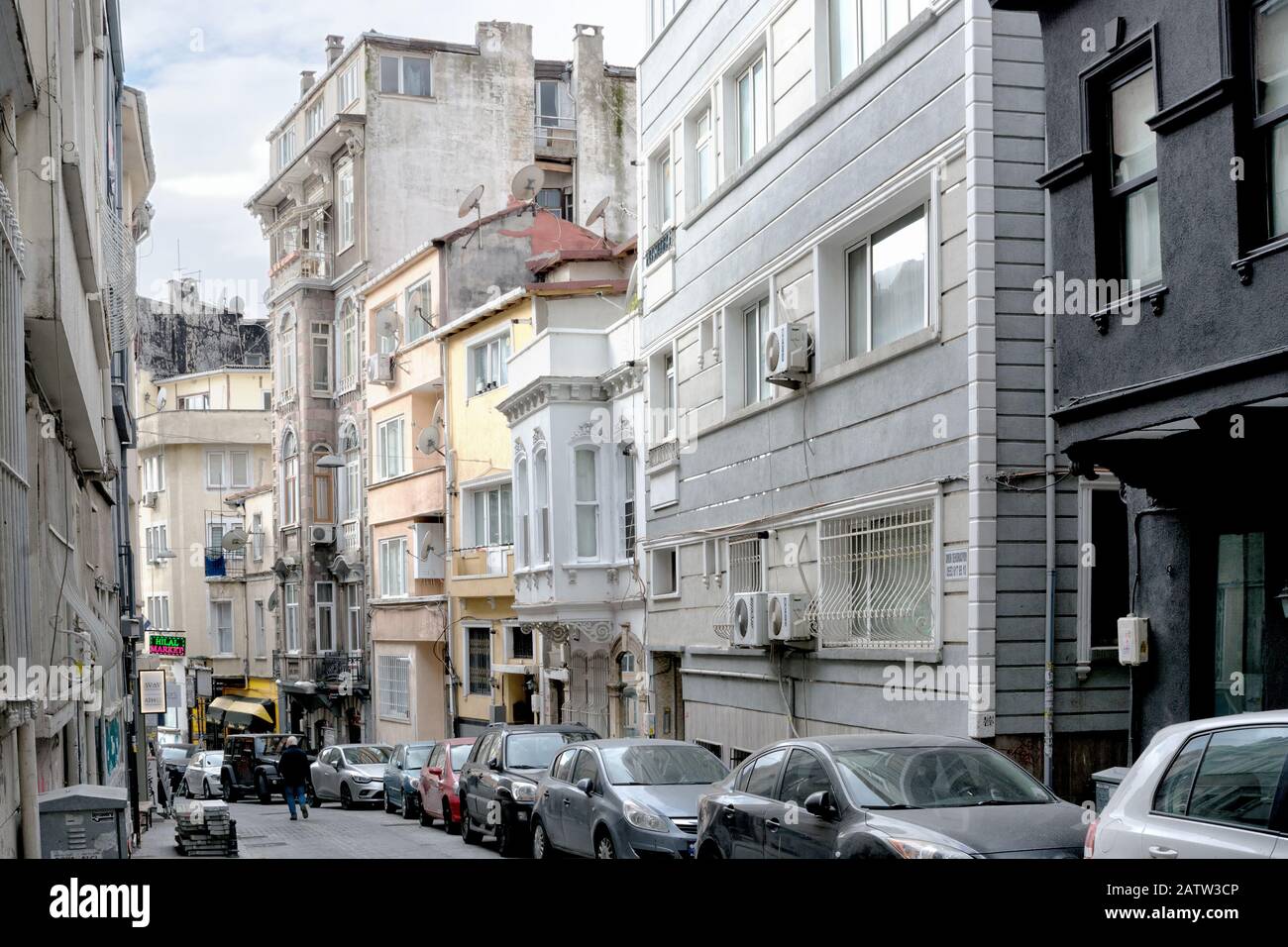 Istanbul, Turkey - January 15, 2020: a narrow street in Istanbul, lined with old and new buildings Stock Photo
