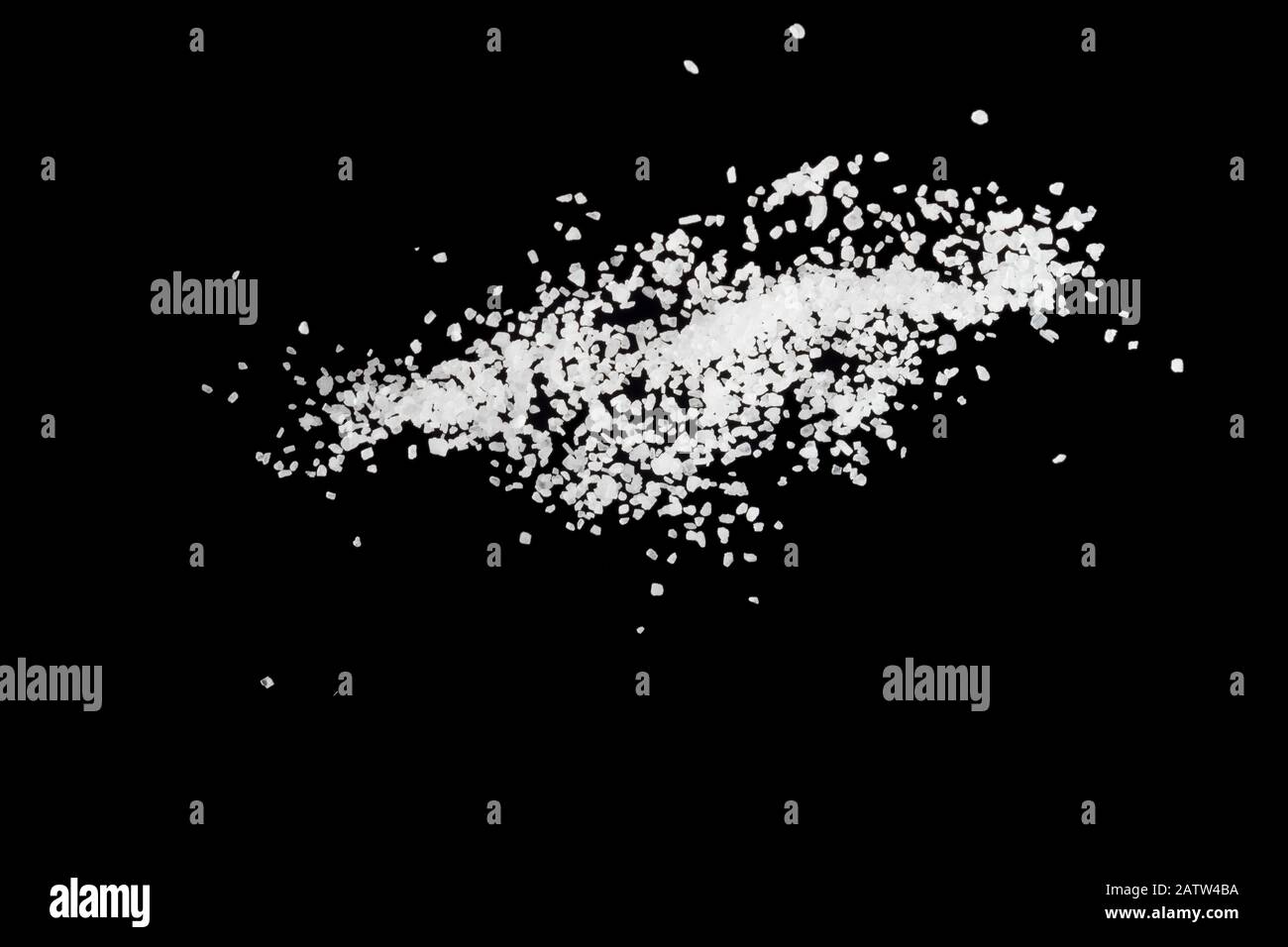 Sea salt explosion isolated on black background close up Stock Photo