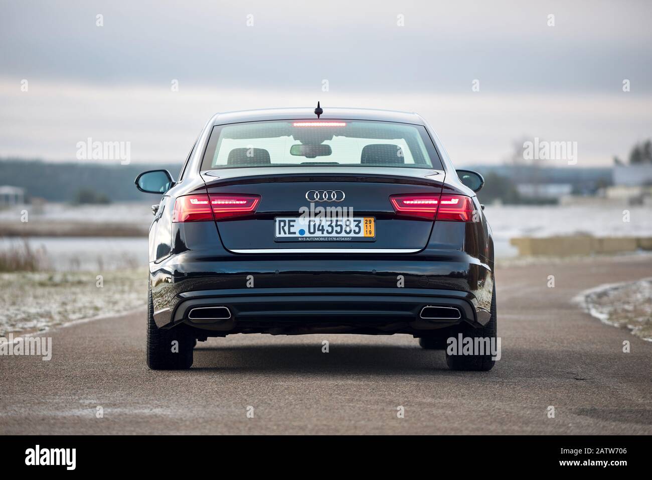GRODNO, BELARUS - DECEMBER 2019: Audi A6 4G, C7 2.0 TDI 190 Hp 2016 black  metallic rear view outdoors on winter empty road with dark forest on Stock  Photo - Alamy