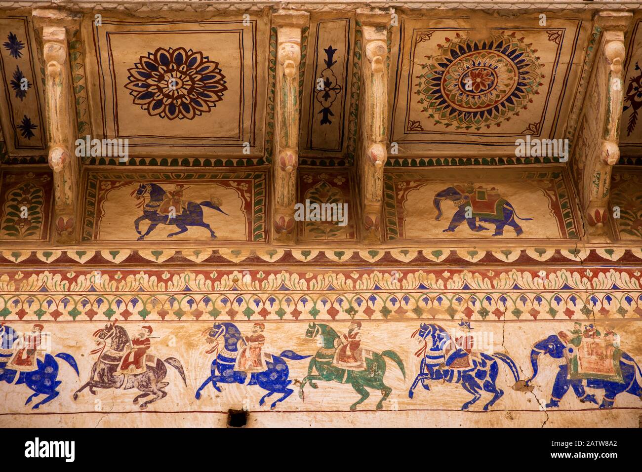 India, Rajasthan, Shekhawati, Ramgarh, haveli wall decoration painted horsemen frieze Stock Photo