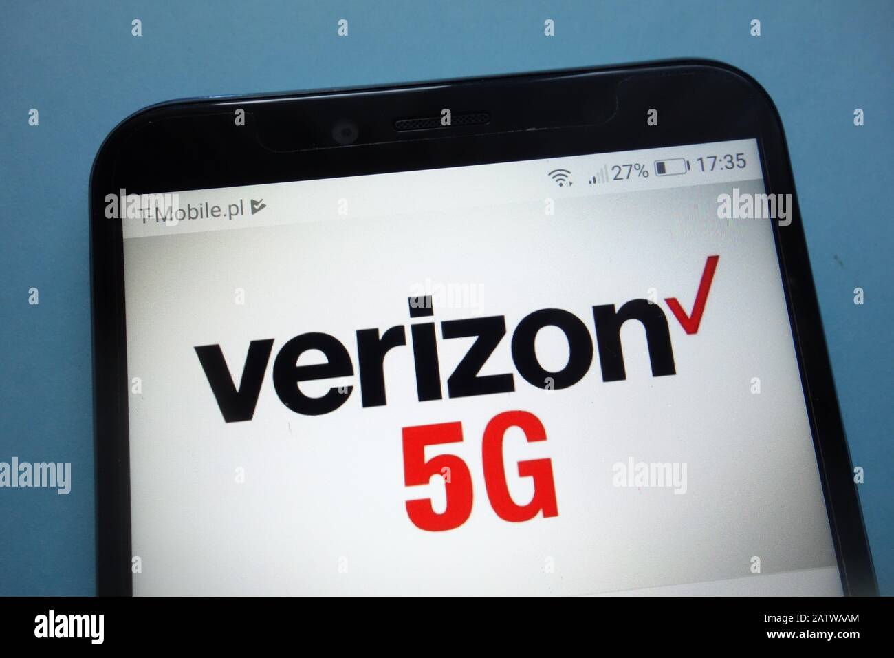 Verizon 5G logo on smartphone Stock Photo