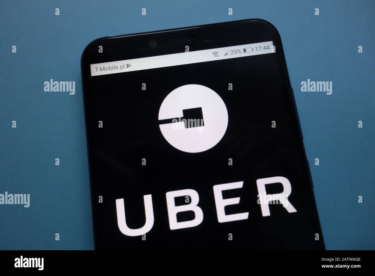 Uber logo on smartphone Stock Photo