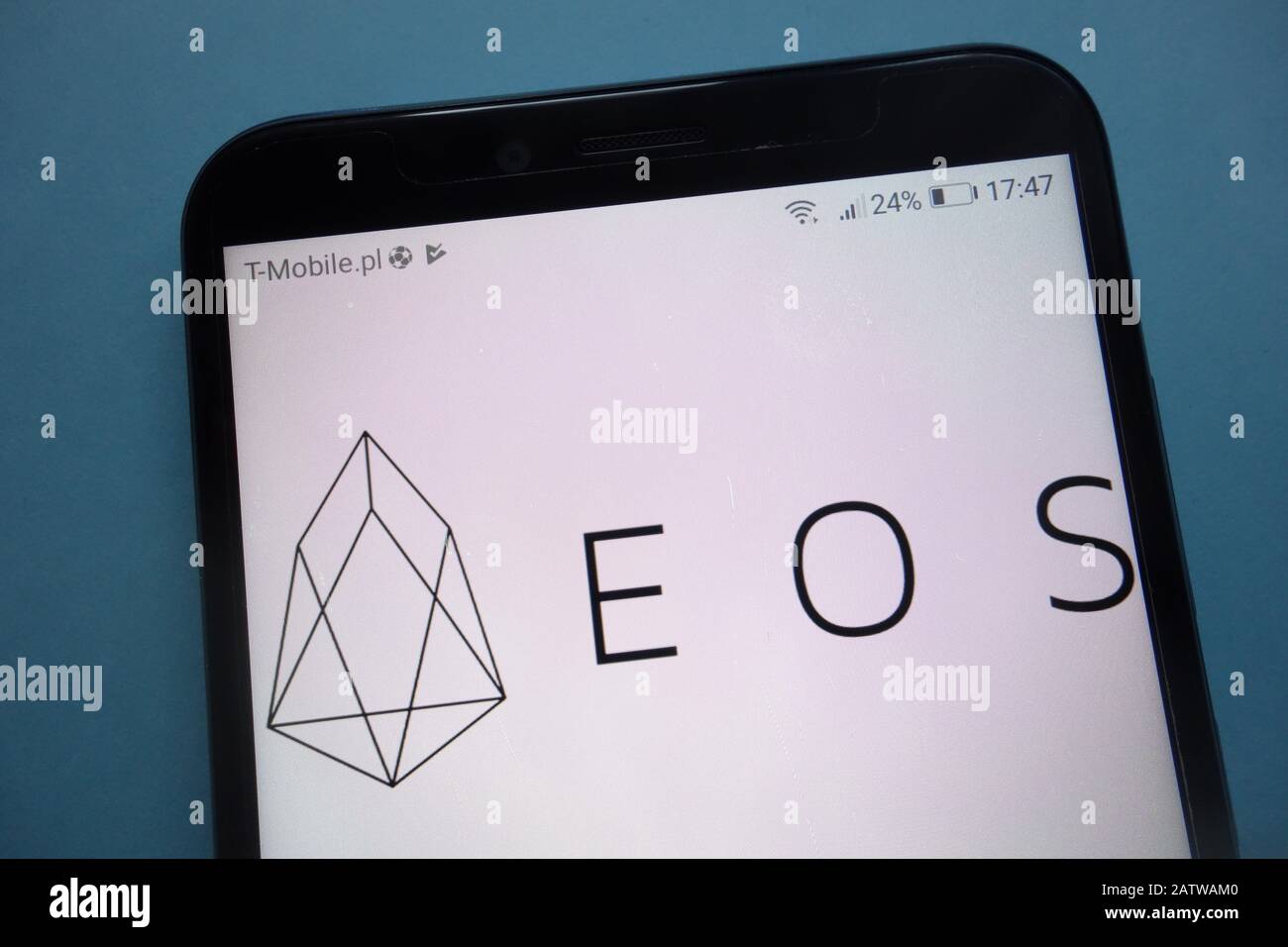 EOS cryptocurrency logo on smartphone Stock Photo