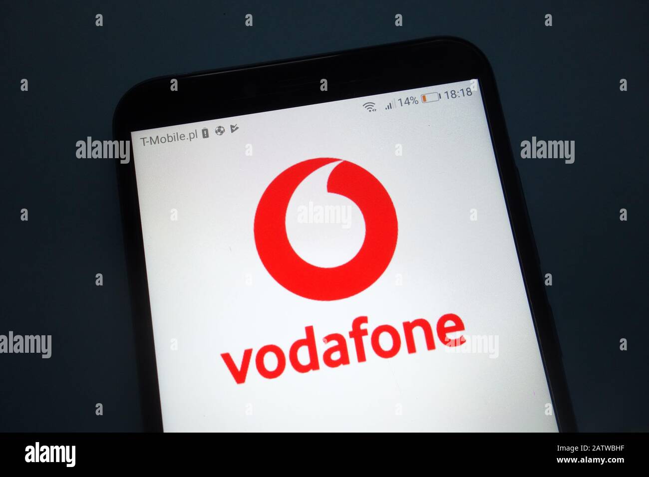 Vodafone logo on smartphone Stock Photo
