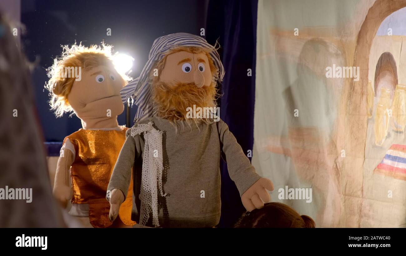 Puppet theater playing Bible story puppet man with beard and in