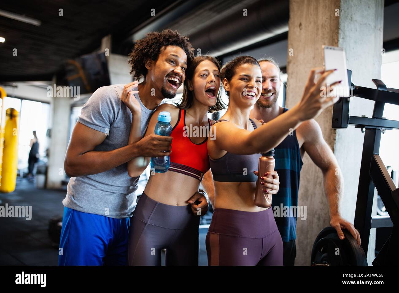 Friends making selfie in the gym after workout Stock Photo - Alamy