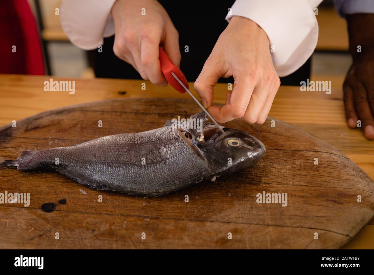 Fish cutting station hires stock photography and images Alamy
