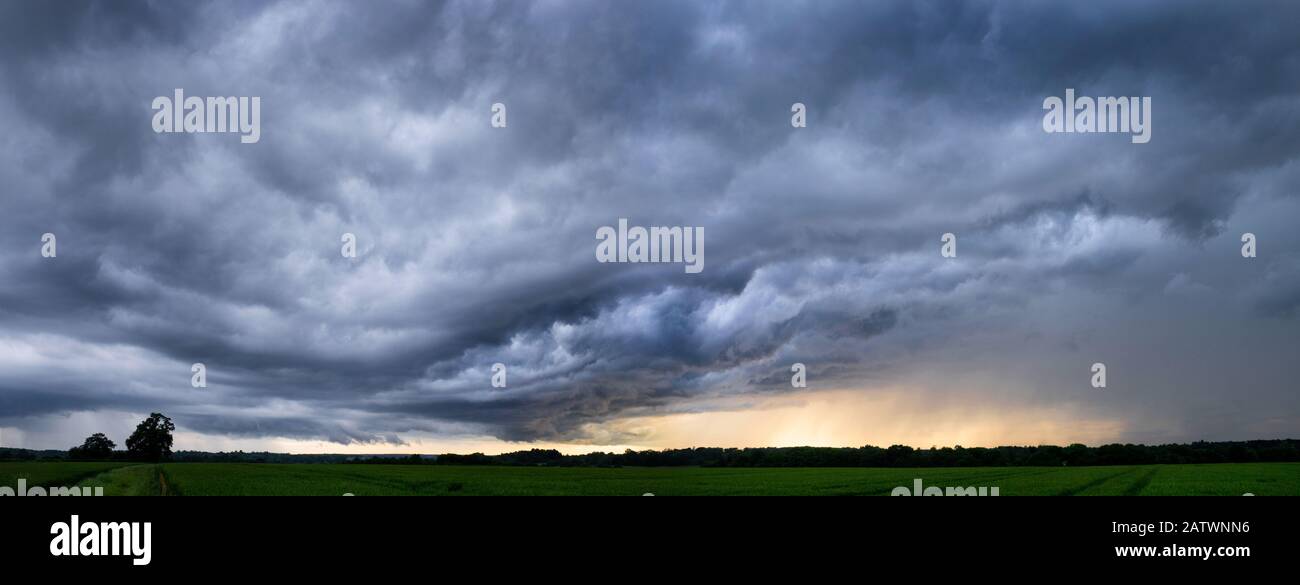 Dramatic storm clouds gathering in Perry Green, Much Hadham, Hertfordshire. UK Stock Photo