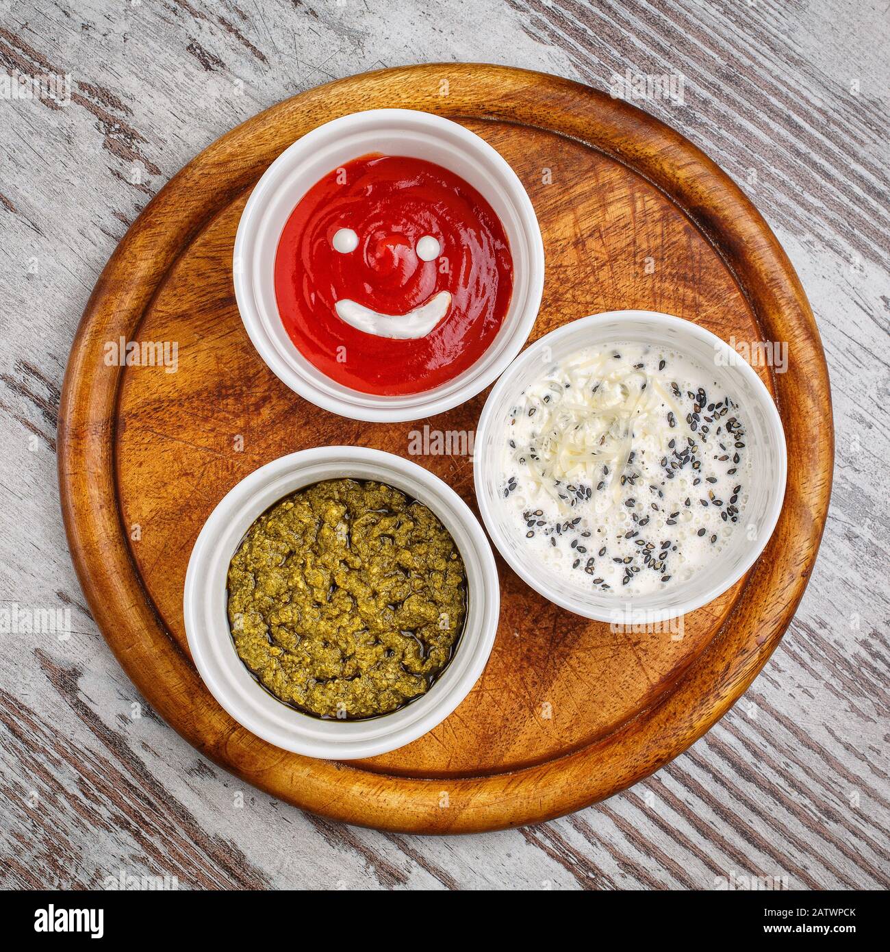 Three kinds of sauce traditional classic ketchup, barbecue sauce, sweet and cheesy sauce Stock