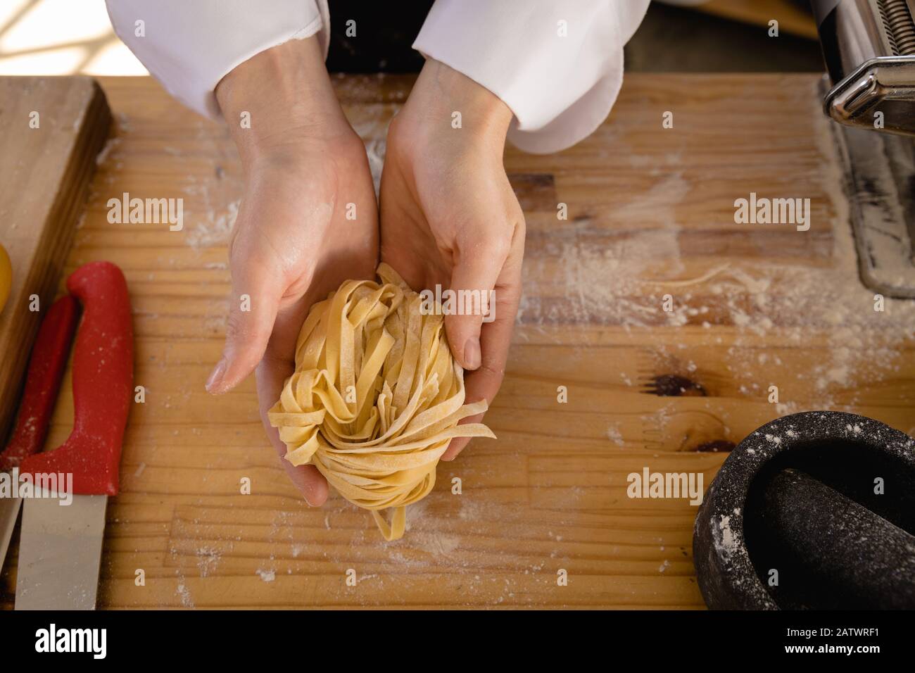 Caucasian chef making pasta Stock Photo