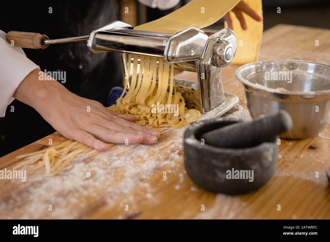 Caucasian chef making pasta Stock Photo