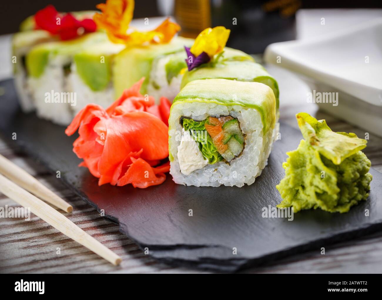 Tasty sushi set. Japanese traditional dishes. Rice rolls. Close up. Stock Photo
