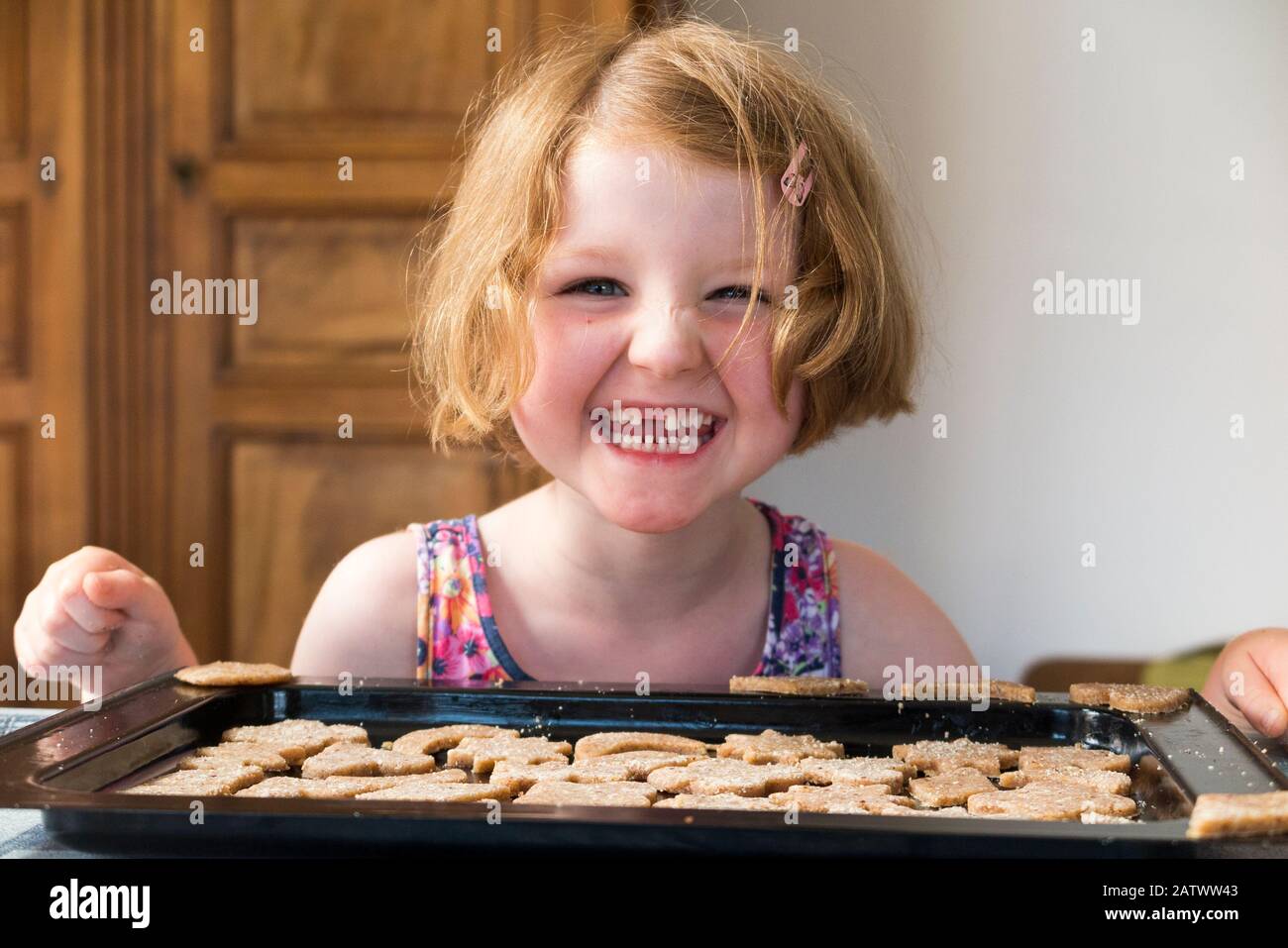 Cooked pastry shapes from baking tray hires stock photography and