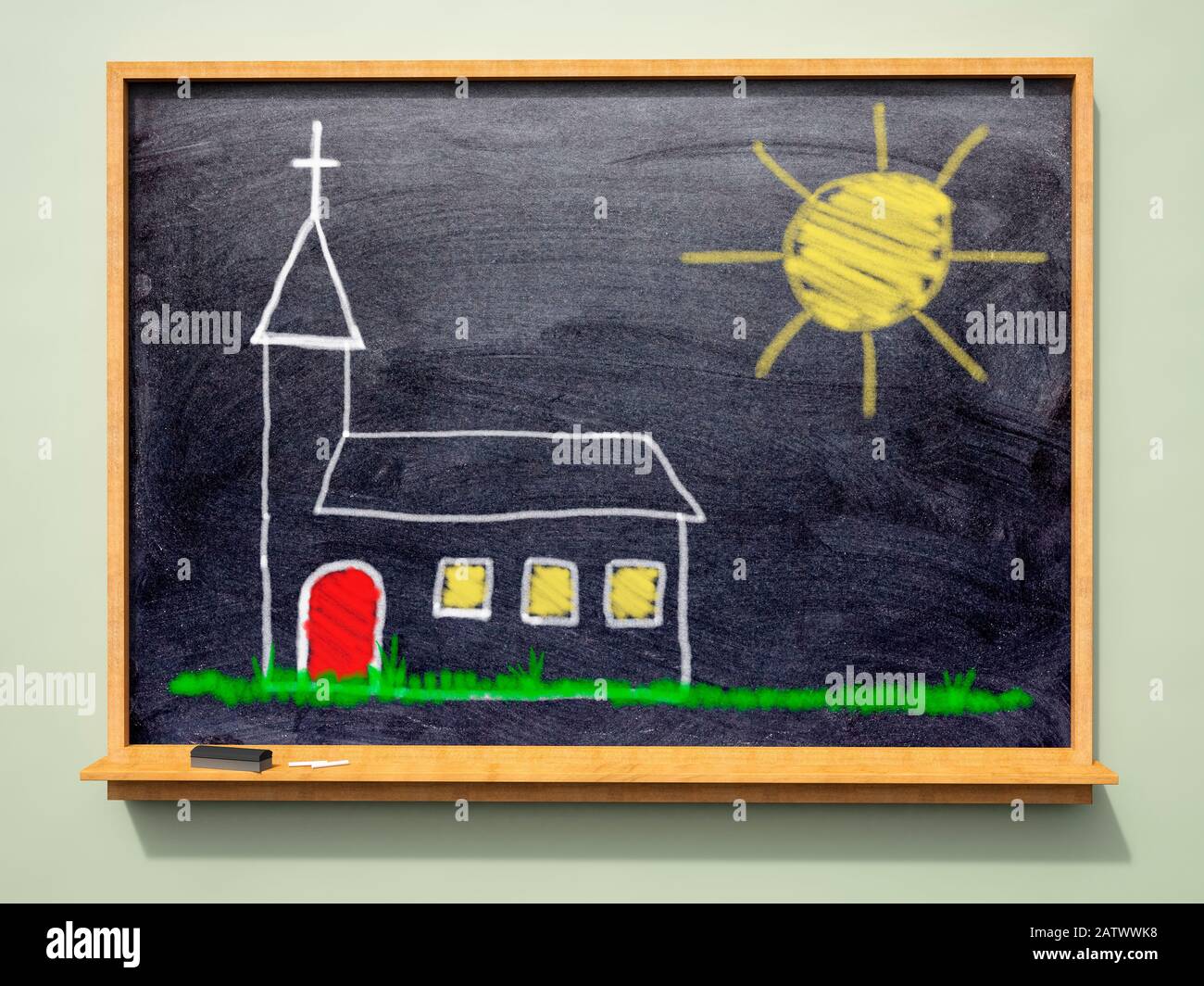 Child's drawing of a church and sun on a small blackboard Stock Photo