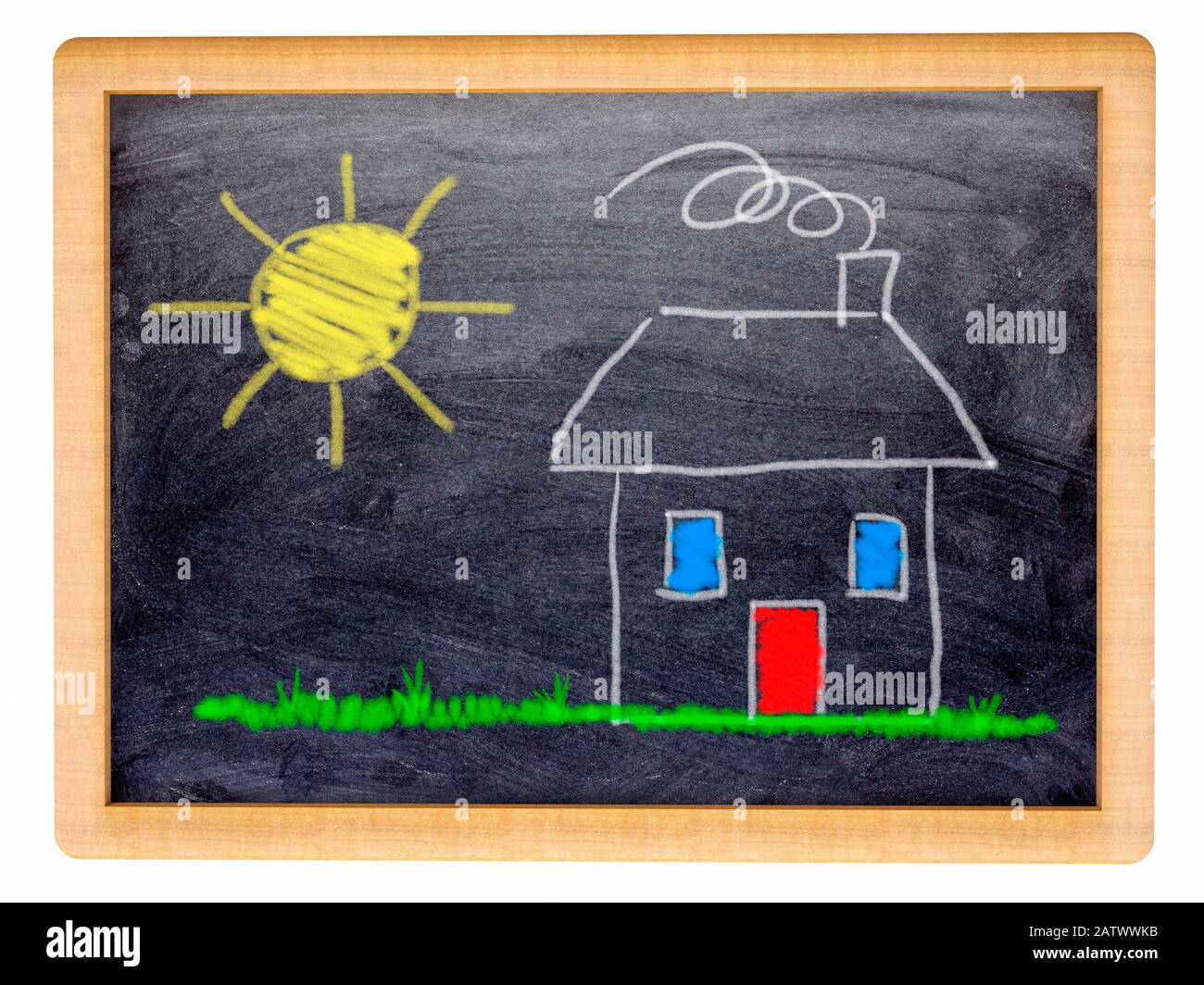 Childs drawing of a small house and sun on a small blackboard Stock Photo