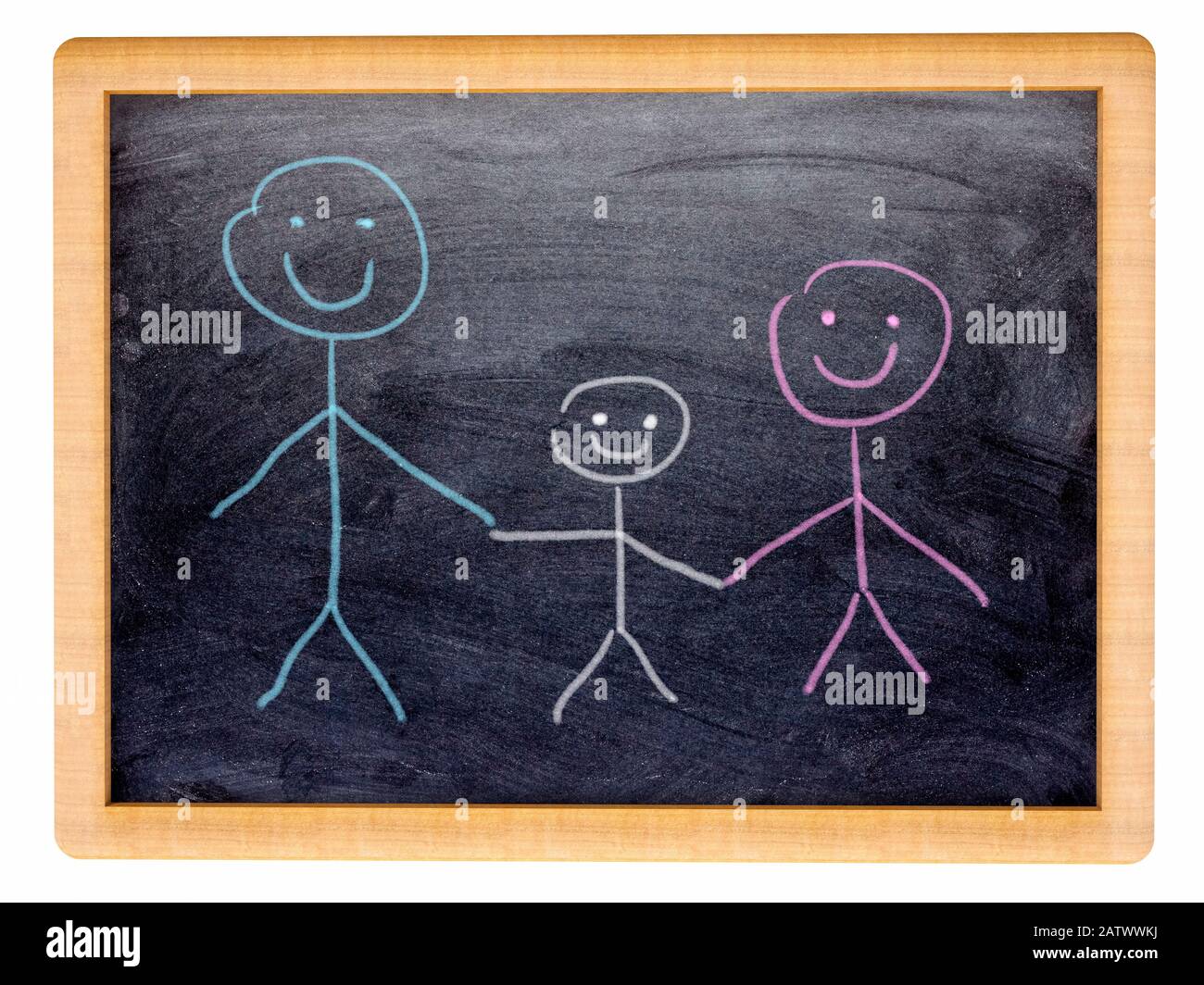 Family, drawing. Small blackboard with a child's drawing of a happy family unit, two adults and one child smiling and holding hands Stock Photo