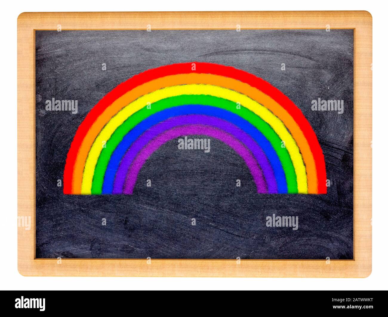 A multi coloured rainbow drawn on a small blackboard Stock Photo