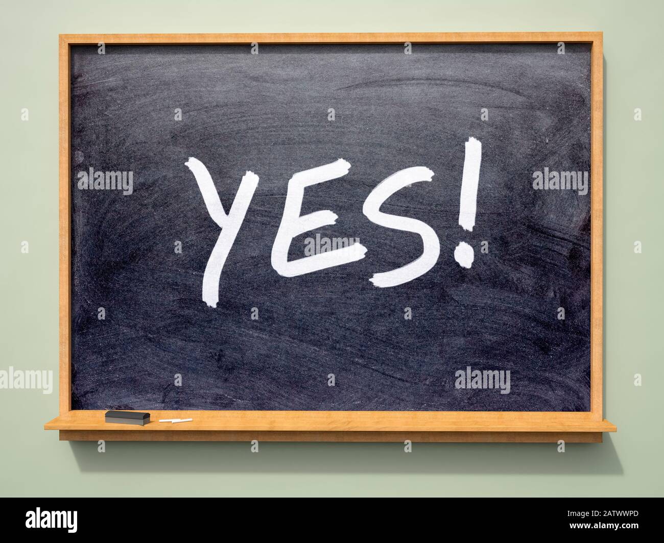School blackboard with 'YES!' written on it Stock Photo