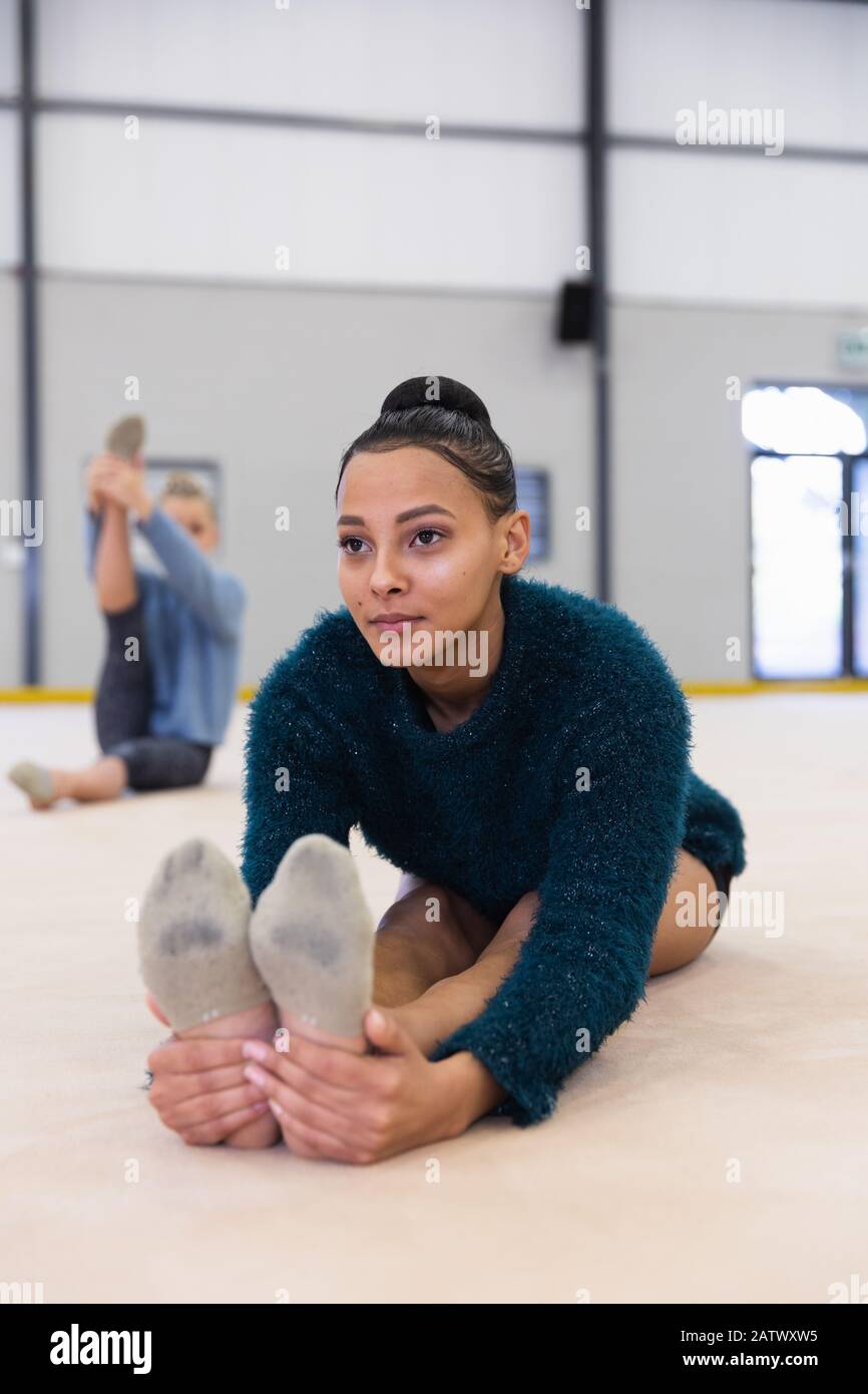 Gymnasts stretching at the gym Stock Photo - Alamy