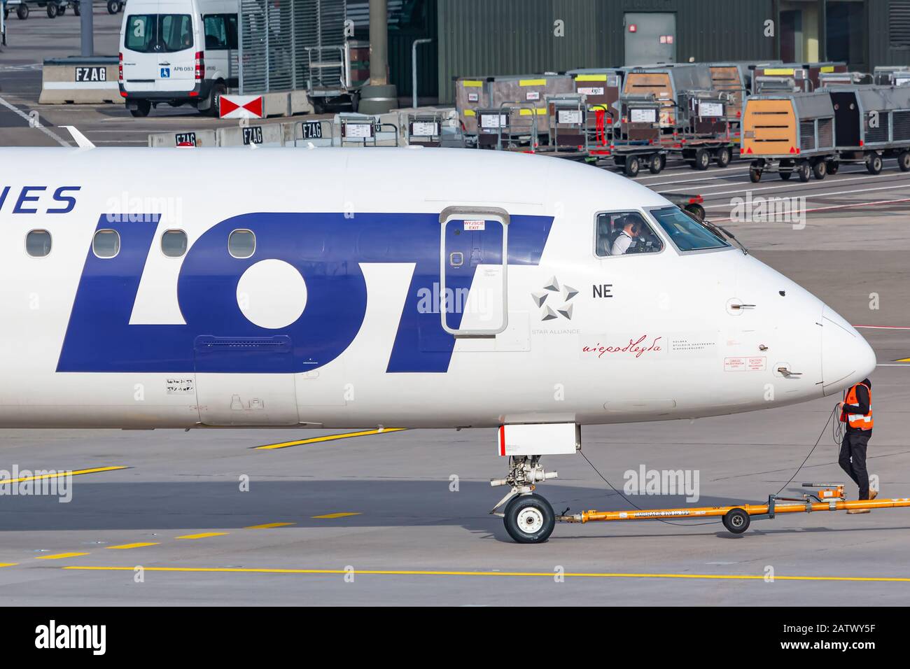 Zurich, Switzerland - February 1, 2020: LOT Polish Airlines Embraer E195 airplane at Zurich airport (ZRH) in Switzerland. Embraer is an aircraft manuf Stock Photo