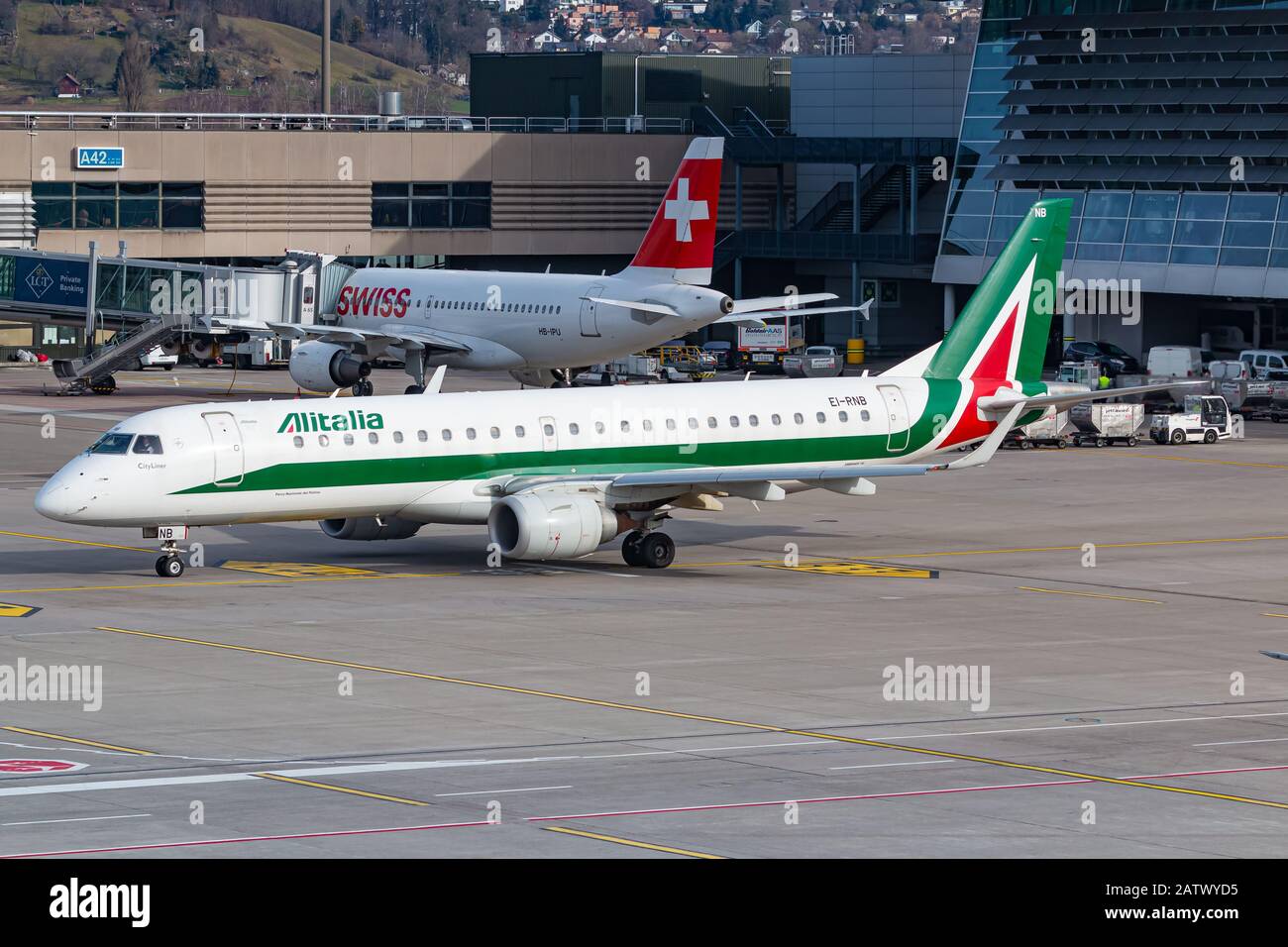 Zurich, Switzerland - February 1, 2020: Alitalia Embraer E195 airplane at Zurich airport (ZRH) in Switzerland. Stock Photo