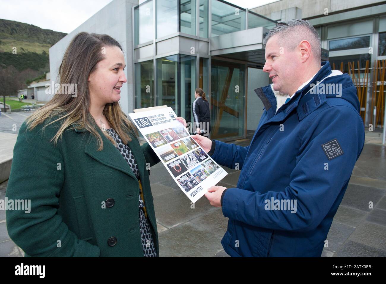 Edinburgh, UK. 5th Feb, 2020. Pictured: (L-R) Lyndsey Croal - Public Affairs of WWF Scotland; Derek Mackay MSP - Cabinet Minister for Finance. People from WWF (World Wild Fund) are seen petitioning Finance Minister, Derek Mackay outside the Scottish Parliament the day before Scottish Budget is announced. WWF Scotland are calling for larger investment for agriculture, green energy, to restoring and protecting nature. https://www.wwf.org.uk/scotland/climate-crisis-emergency-response#edit-container Credit: Colin Fisher/Alamy Live News Stock Photo
