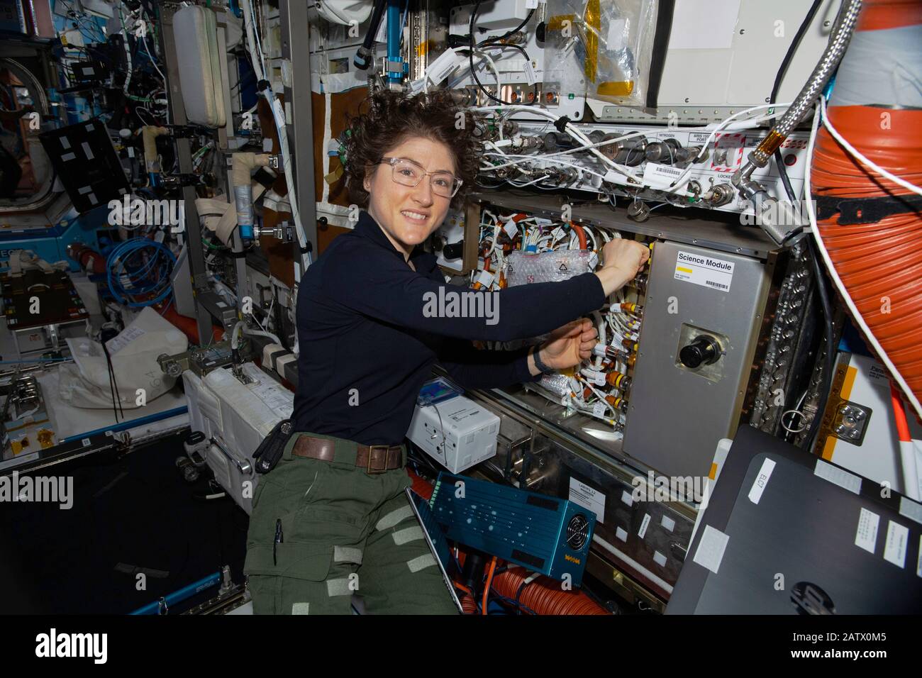 ISS - Jan. 28, 2020 - NASA astronaut and Expedition 61 Flight Engineer Christina Koch works on the Cold Atom Lab (CAL) swapping and cleaning hardware Stock Photo