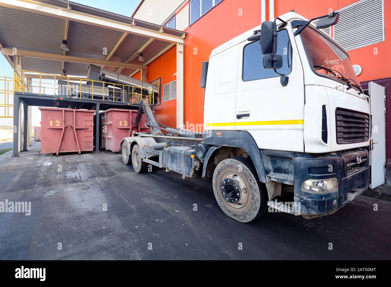 At modern waste recycling plant yard, process of loading sorted garbage ...