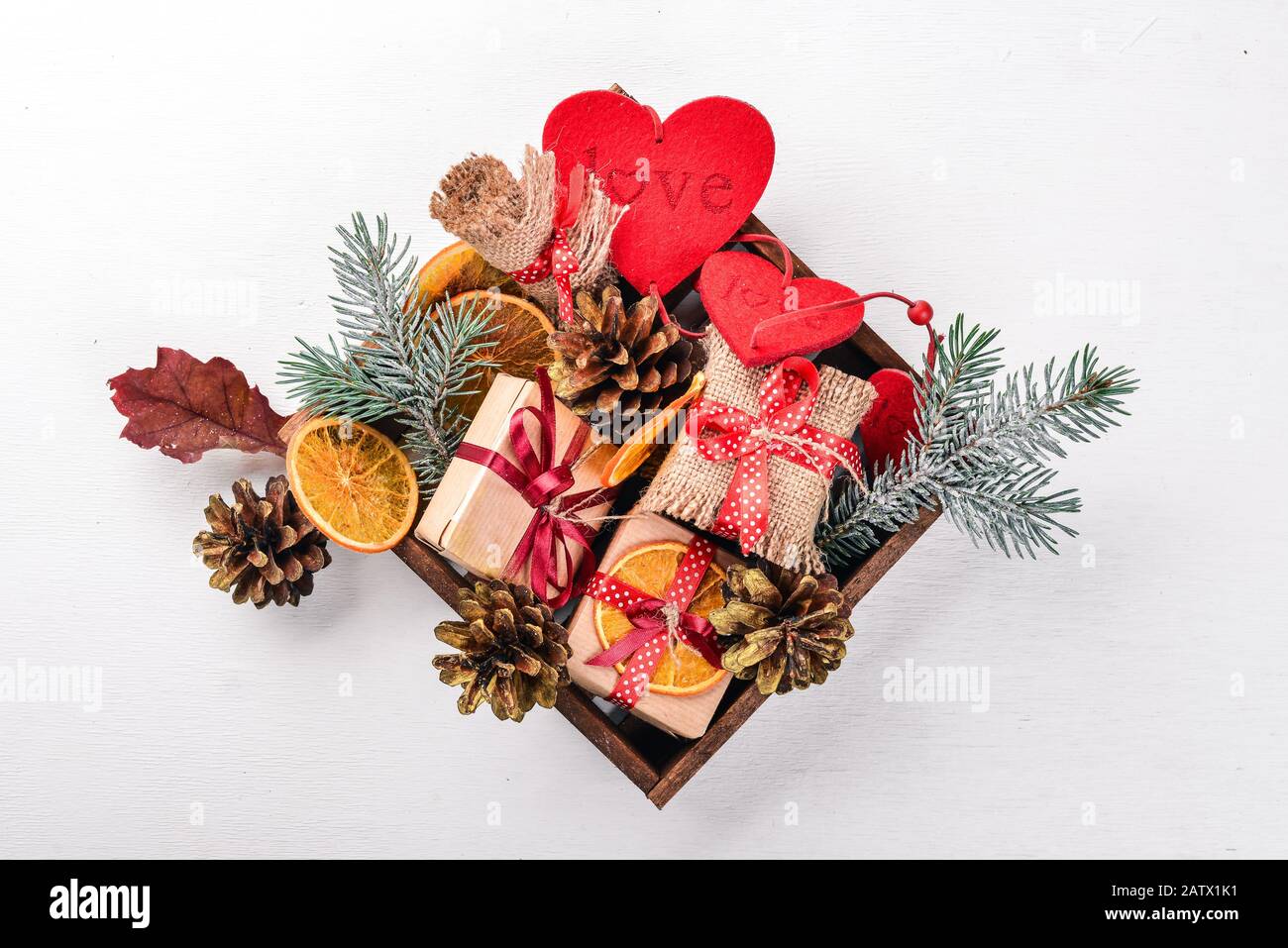 Christmas wooden background with snow fir tree and decoration. Top view ...
