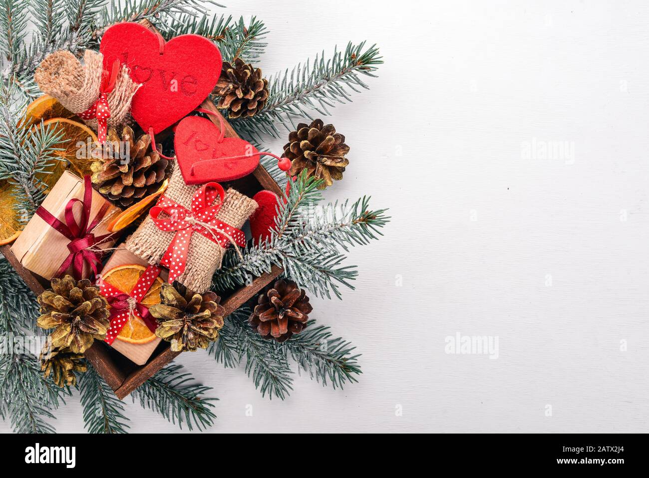 Christmas wooden background with snow fir tree and decoration. Top view ...
