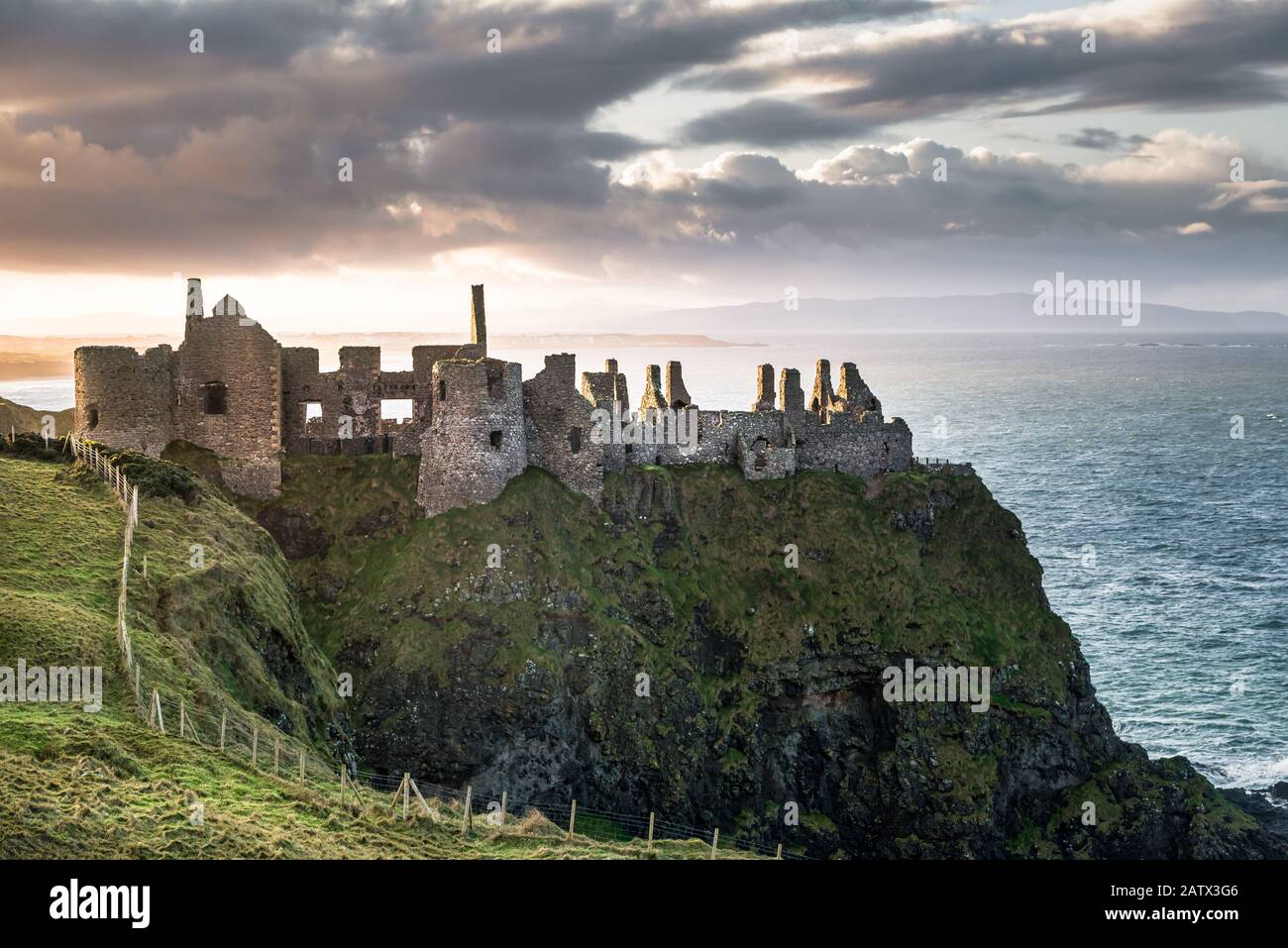 Dunluce Castle high up on a seacliff on the North Antrim coast in Northern Ireland Stock Photo