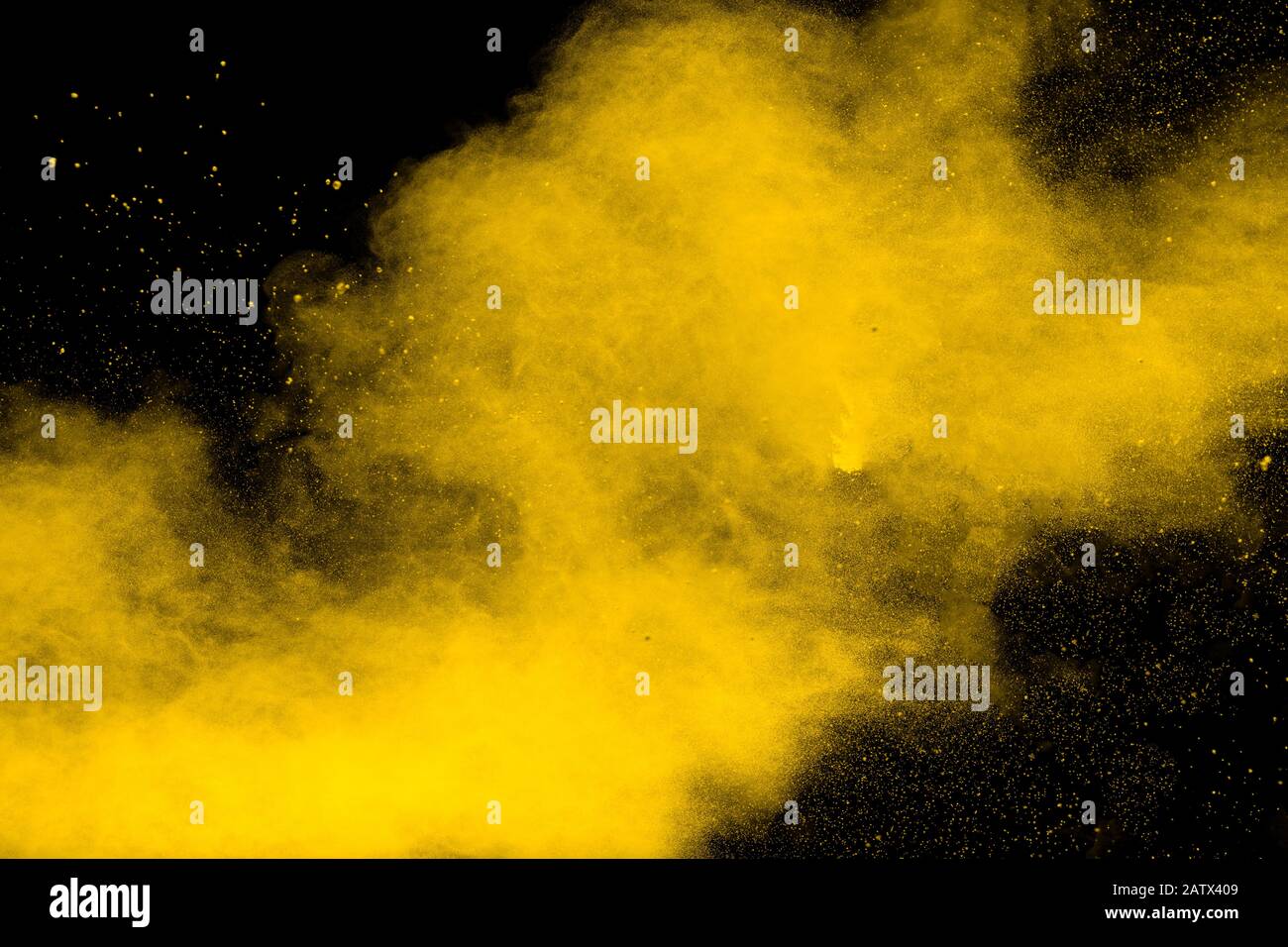 Yellow dust particles explosion on black background.Yellow powder splash Stock Photo Alamy
