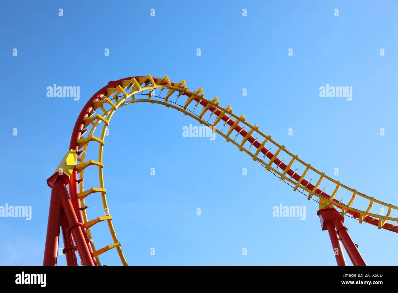 Yellow/red rollercoaster looping track Stock Photo
