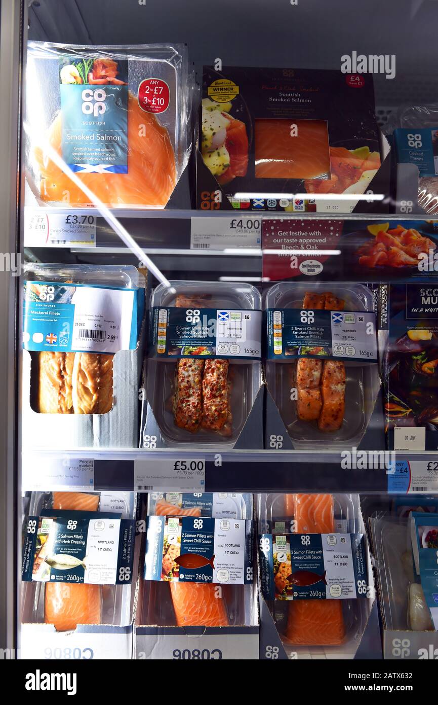Packets of fish for sale in a supermarket, UK Stock Photo
