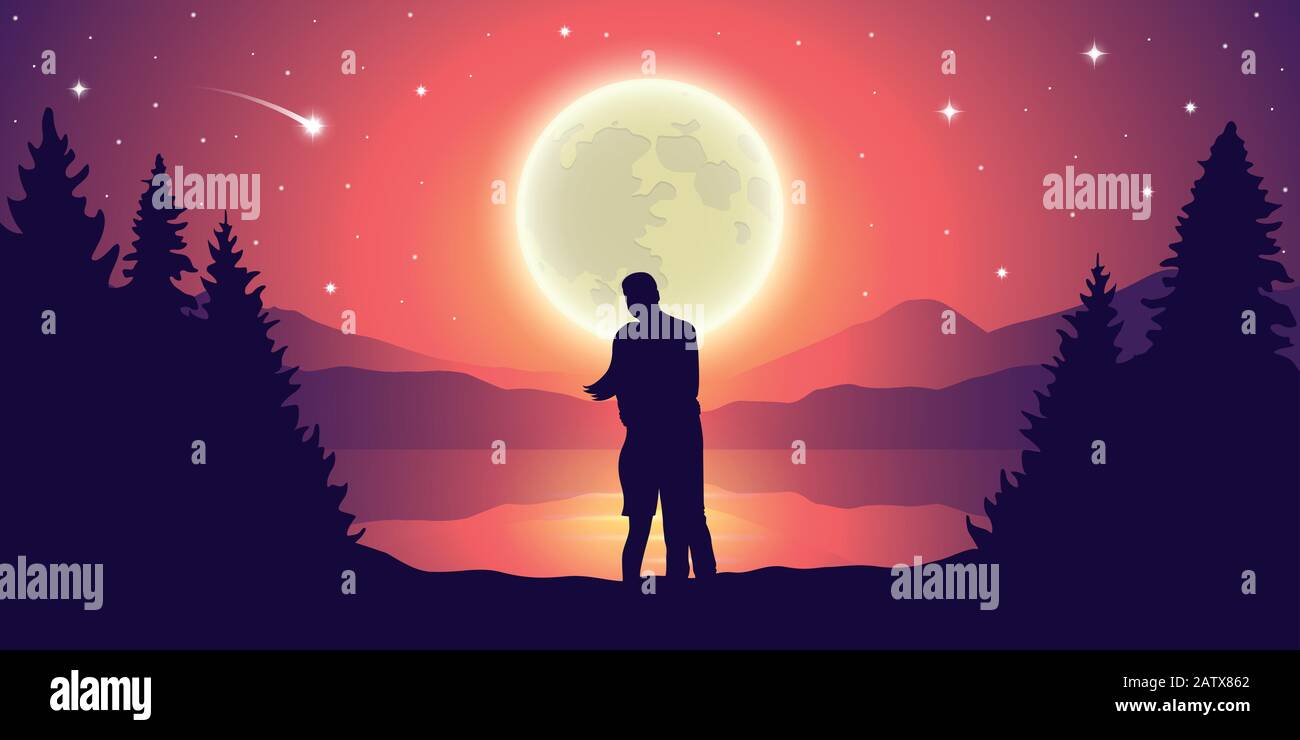 couple looks to the full moon and falling stars at beautiful lake ...