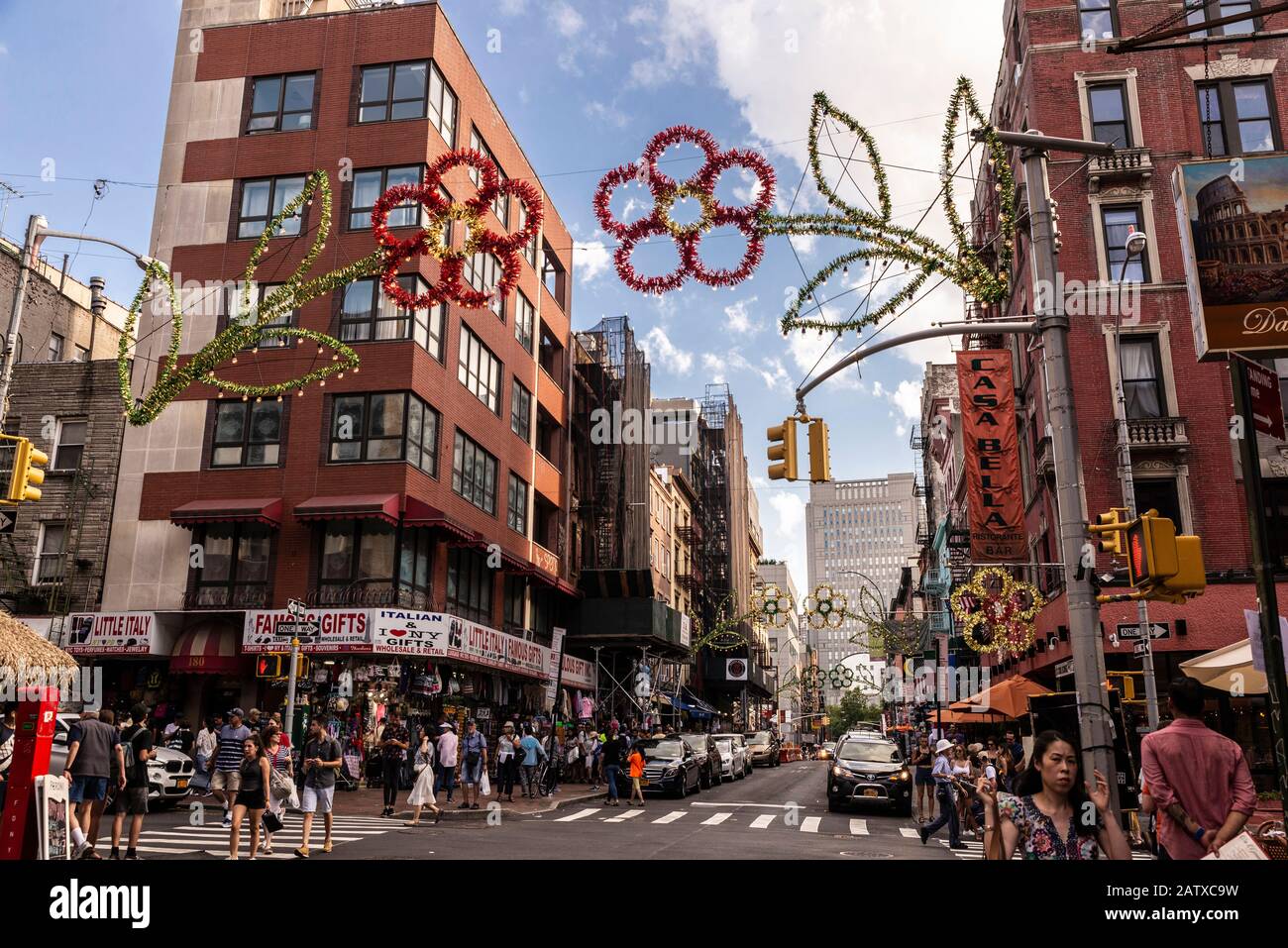 New York City, USA - August 2, 2018: Street with many restaurants and shops with people around in Little Italy, Lower Manhattan, New York City, USA Stock Photo