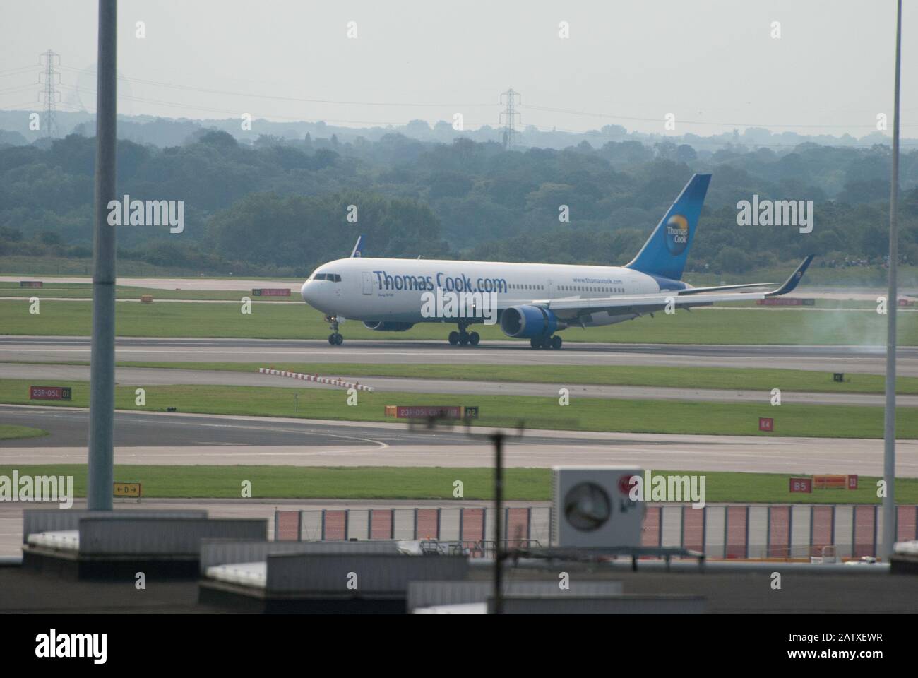 Thomas Cook Aircrafts landing at Manchester International Airport. Stock Photo