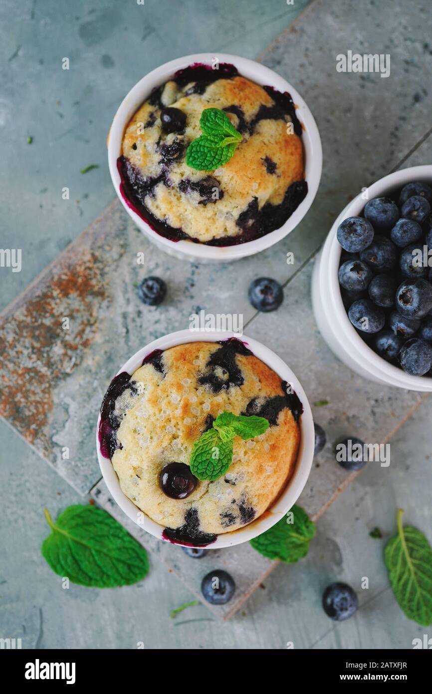 Homemade Blueberry Muffin for one baked in a ramekin, selective focus