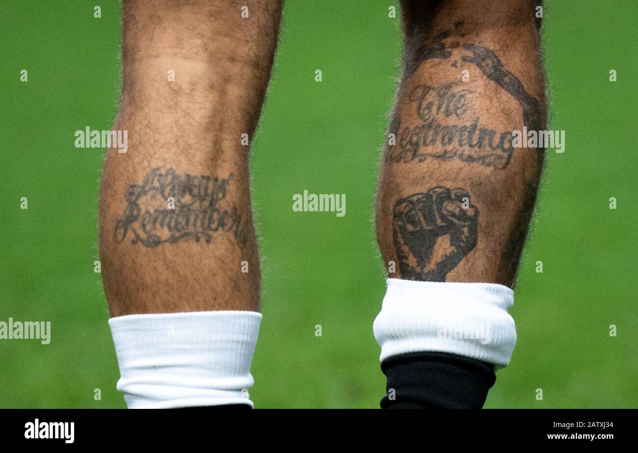 Oxford, UK. 04th Feb, 2020. The Leg Tattoos of DeAndre Yedlin of Newcastle  United displaying 'Always Remember The Beginning' during the FA Cup 4th  round replay match between Oxford United and Newcastle