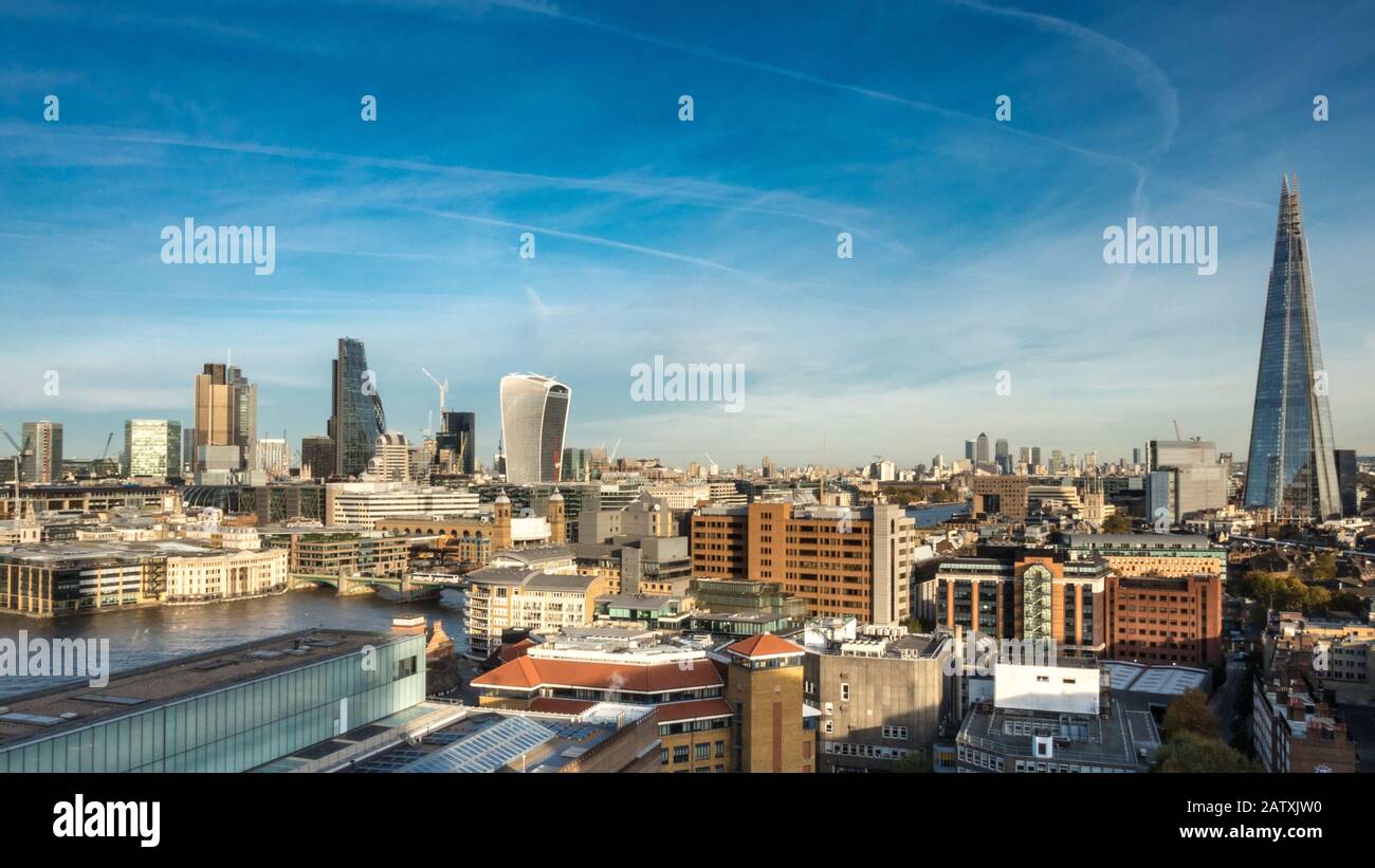 London Skyline. Wide angle panoramic view over the City of London, the River Thames and the iconic Shard skyscraper. Stock Photo