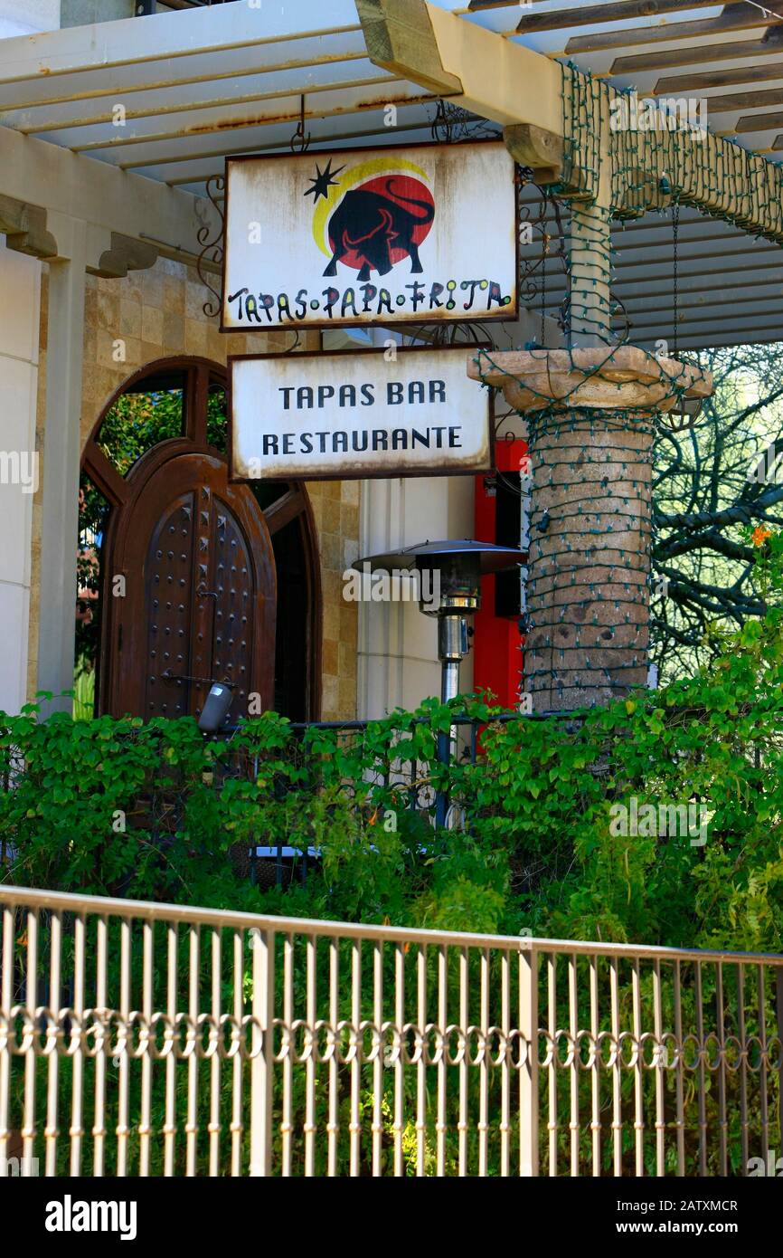 Tapas Pap Frita bar restaurant overhead signs in the Southbridge district of Scottsdale, AZ Stock Photo